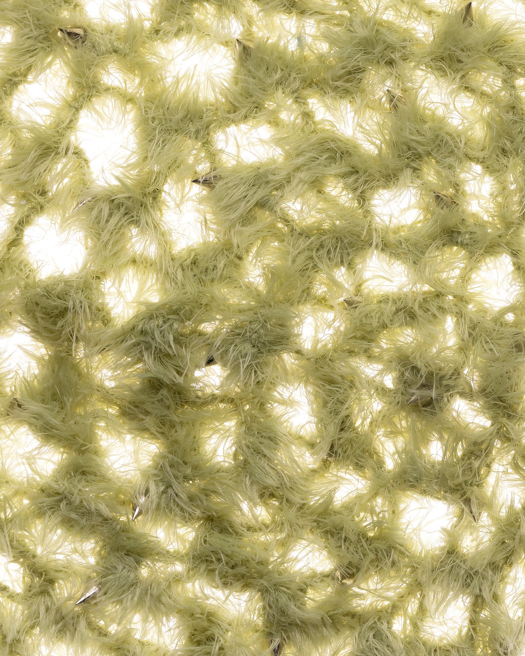 fuzzy green bonnet with spikes