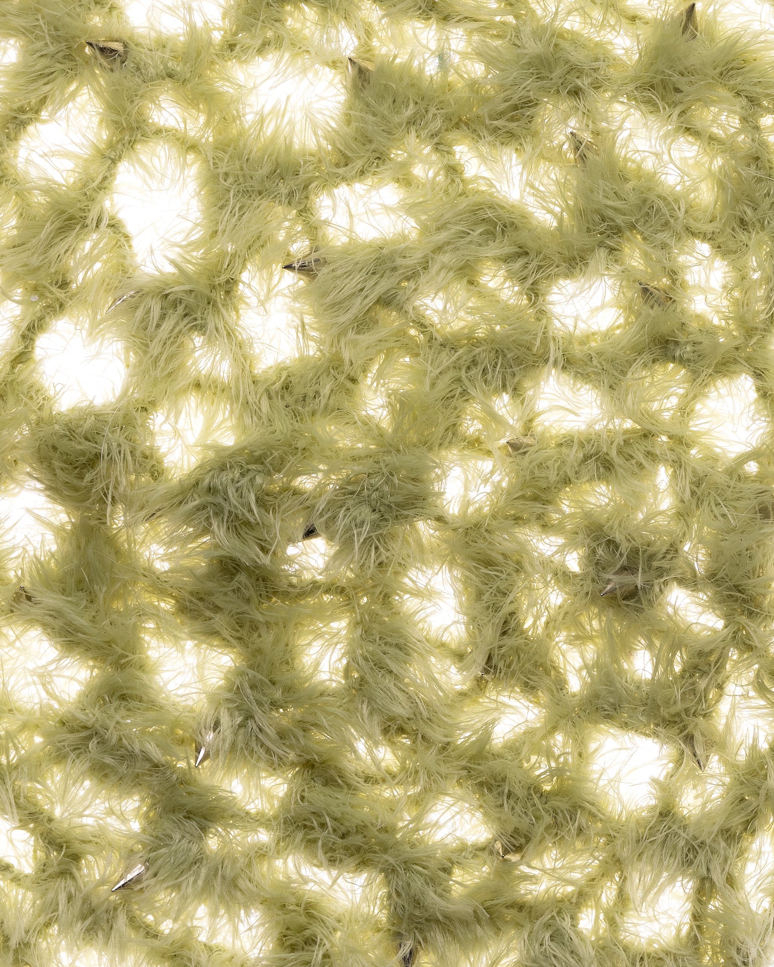 fuzzy green bonnet with spikes